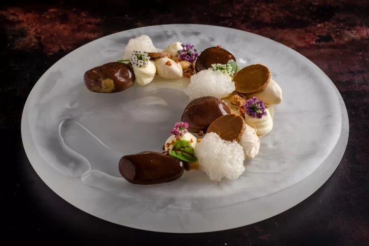 Coffee, Chocolate and Hazelnut Mousse Pebbles Glazed with a Coffee Gel Coffee, Chocolate and Hazelnut Mousse Pebbles Glazed with a Coffee Gel