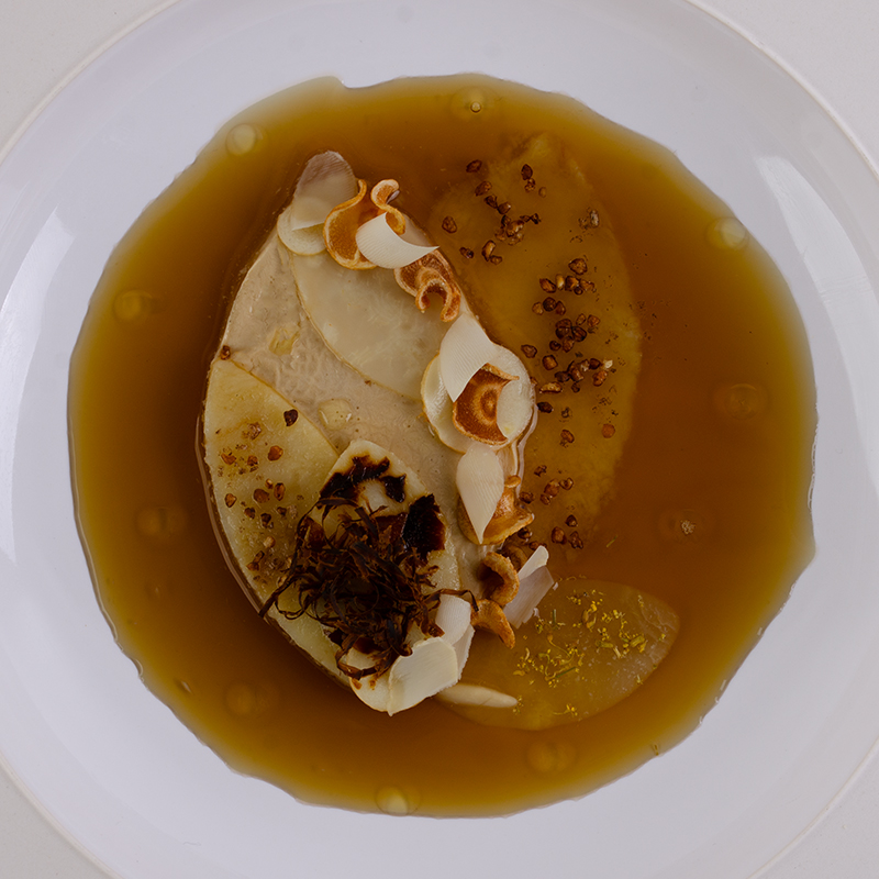Silken Avola Almond served plated with Salt-baked Parsnip and surrounded by Celeriac, Artichoke Broth